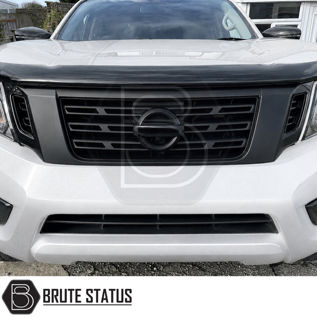 Front mounted matte black ABS plastic grille fitted to Nissan Navara pickup truck offroad 4x4 vehicle. Suitable for overlanding set ups and front mounting camera with adaption. Easy and straightforward installation. 