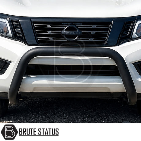 Front heavy duty matte black powder coated bull bar fitted to Nissan Navara NP300 pickup truck offroad 4x4 vehicle. All mounting hardware included. 