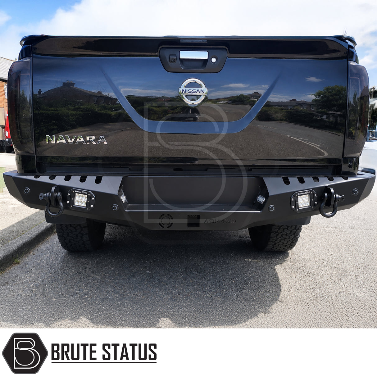 Nissan Navara NP300 2015-2022 rear bumper in matte black, durable carbon steel rear protection bumper with integrated lights, 2-inch hitch receiver styling and premium off-road appearance.