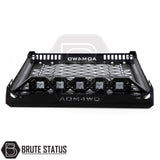 Universal combat style roof basket in matte black steel with optional LED light bar mounted, designed for pickup trucks with roof cross bars. 