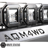 Heavy duty universal roof basket with tough matte black coating and integrated mounting points for LED lights, shown installed on pickup truck roof bars