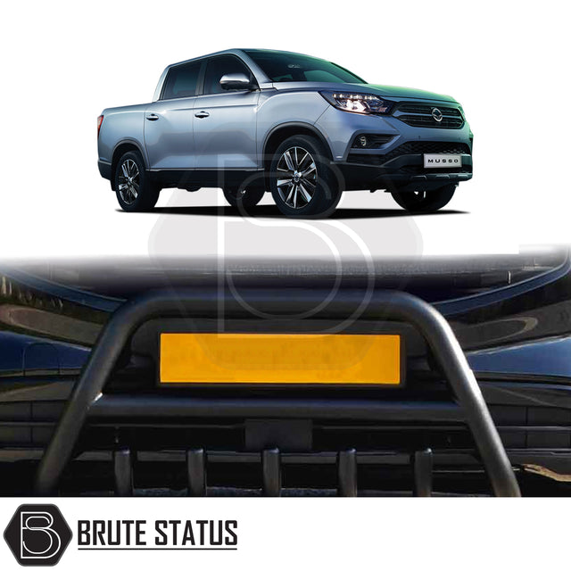 Matte black city bar fitted to a 2018–2021 SsangYong Musso, manufactured from durable carbon steel to enhance styling and provide bumper protection, featuring a TÜV-certified, no-drill, DIY installation using chassis-mounted U-brackets.