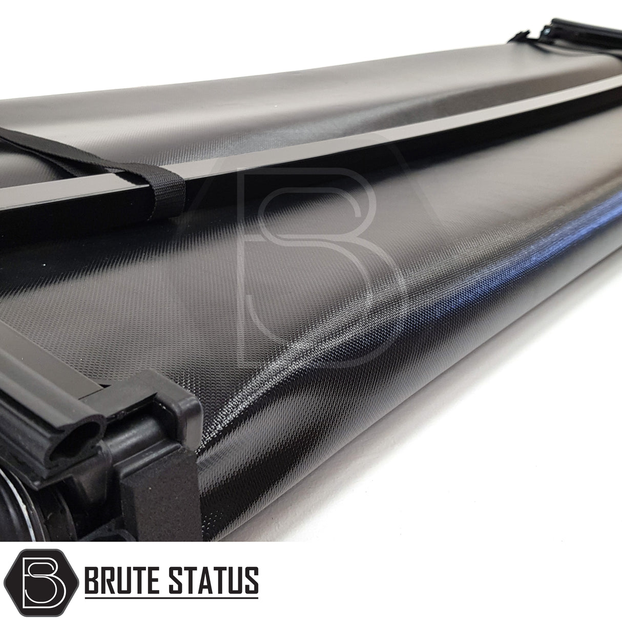 "Premium tri-fold tonneau cover for pickup trucks, featuring UV-stable vinyl, rubber perimeter seals, reinforced corners, and shaped aluminium cross bars for improved durability, aerodynamics, and water resistance. Easy no-drill installation. Not compatible with Wildtrak models with sports bars.