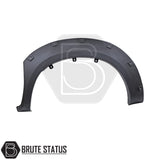 Toyota Hilux 2005–2011 wide wheel arch kit in a riveted fender-flare style. The kit includes textured black, UV-resistant plastic arches with decorative rivet bolts, adding about 65–70 mm of extra width per side. Designed for double-cab, pre-facelift Hilux models, the arches install with 3M adhesive and existing mounting points without drilling.