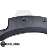 Toyota Hilux 2005–2011 wide wheel arch kit in a riveted fender-flare style. The kit includes textured black, UV-resistant plastic arches with decorative rivet bolts, adding about 65–70 mm of extra width per side. Designed for double-cab, pre-facelift Hilux models, the arches install with 3M adhesive and existing mounting points without drilling.