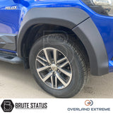 Overland Extreme matte black wide wheel arches for Toyota Hilux 2015–2020 double cab, made from premium ABS plastic with rubber seal interface, precision CAD designed for perfect fitment and UV-protected for long-lasting finish.