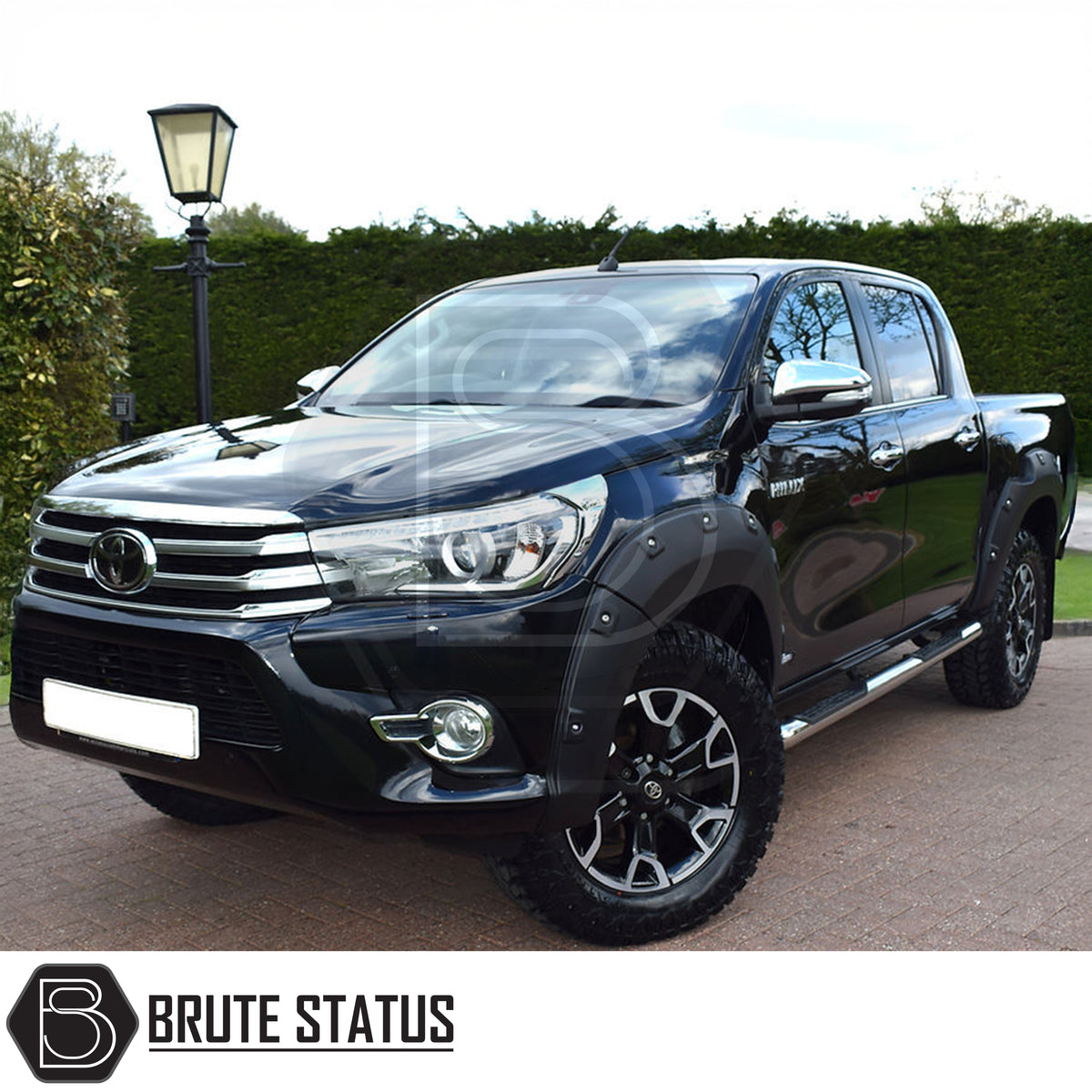 Toyota Hilux 2018-2020 Double Cab wide wheel arch kit with textured black ABS riveted style fender flares adding approximately 65-70mm per side