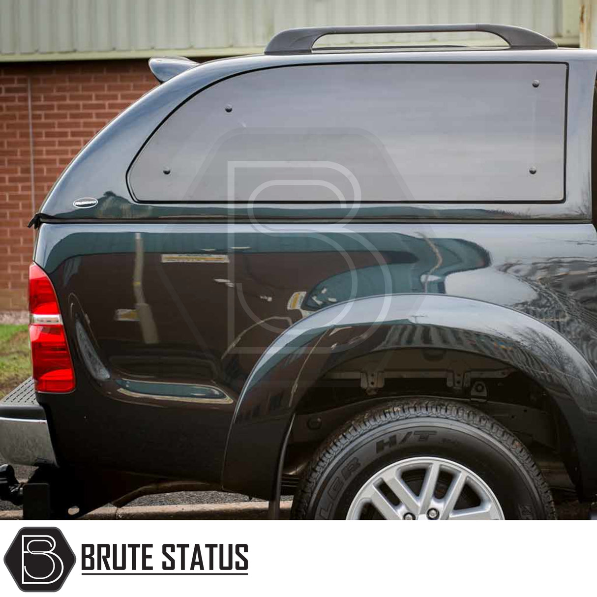 Toyota Hilux 2005-2016 MK6, MK7 Truckman Grand Hardtop Canopy with smooth fiberglass shell, contoured side panel, roof rails, and integrated remote locking.