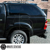 Toyota Hilux 2005-2016 MK6, MK7 Truckman Grand Hardtop Canopy with tinted windows, roof rails, and remote locking, showcased on a black pickup with Brute Status logo.