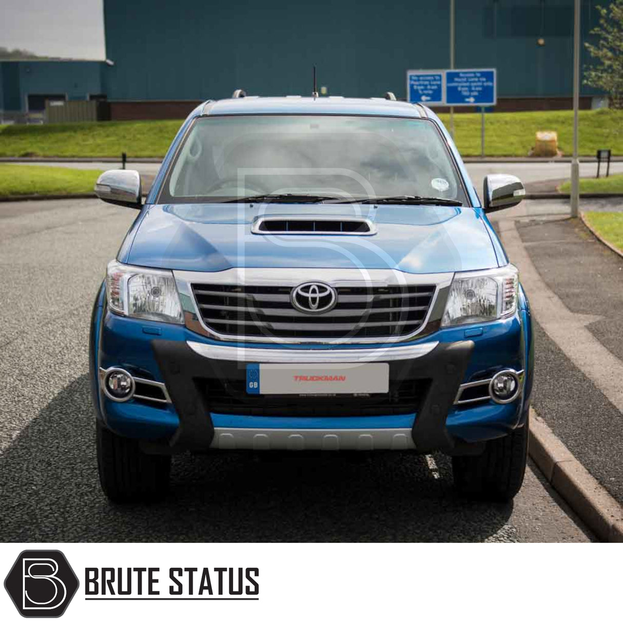 Toyota Hilux 2005-2016 MK6, MK7 Truckman Grand Hardtop Canopy with remote locking, cab-high design, tinted windows, and pop-out side windows, parked on a street.