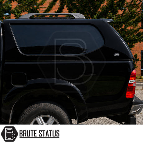 Truckman L-Series canopy fitted to Toyota Hilux pickup truck with solid side panels and LED interior light