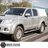 Silver Toyota Hilux with Truckman RS hardtop canopy featuring a glazed rear window, offering enhanced security and versatility for commercial use.
