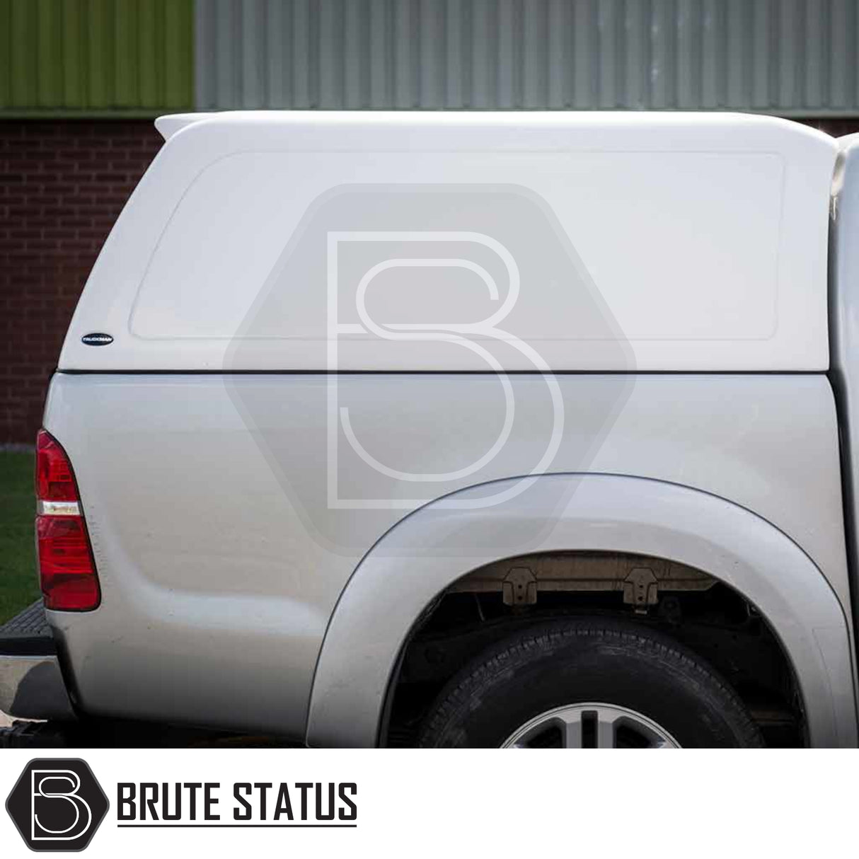 Toyota Hilux 2005-2016 Truckman RS Hardtop Canopy with a glazed rear window, showing secure, solid-sided design, fitted on a pickup truck.