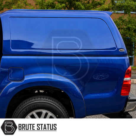 Heavy-duty Truckman RS canopy for Toyota Hilux pickup trucks with solid rear panel and gel coat finish