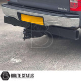 Chrome rear bumper for Toyota Hilux 2011–2014, featuring a factory-style finish, non-slip step pads with drainage channels, and direct bolt-on installation for enhanced durability and functionality