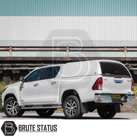 Toyota Hilux 2016+ MK8, MK9 Truckman RS Hardtop Canopy with solid rear window, parked. Ideal for secure, versatile commercial use on pickup trucks.