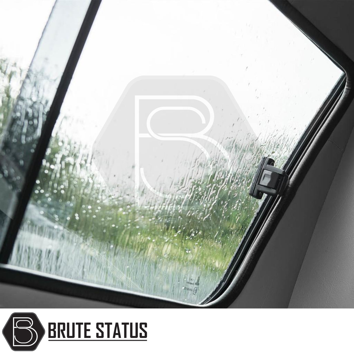 Close-up of a Toyota Hilux Invincible X Truckman GLS Hardtop Canopy's triangular vent window with raindrops, showcasing the canopy's secure, lockable sliding windows for ventilation.