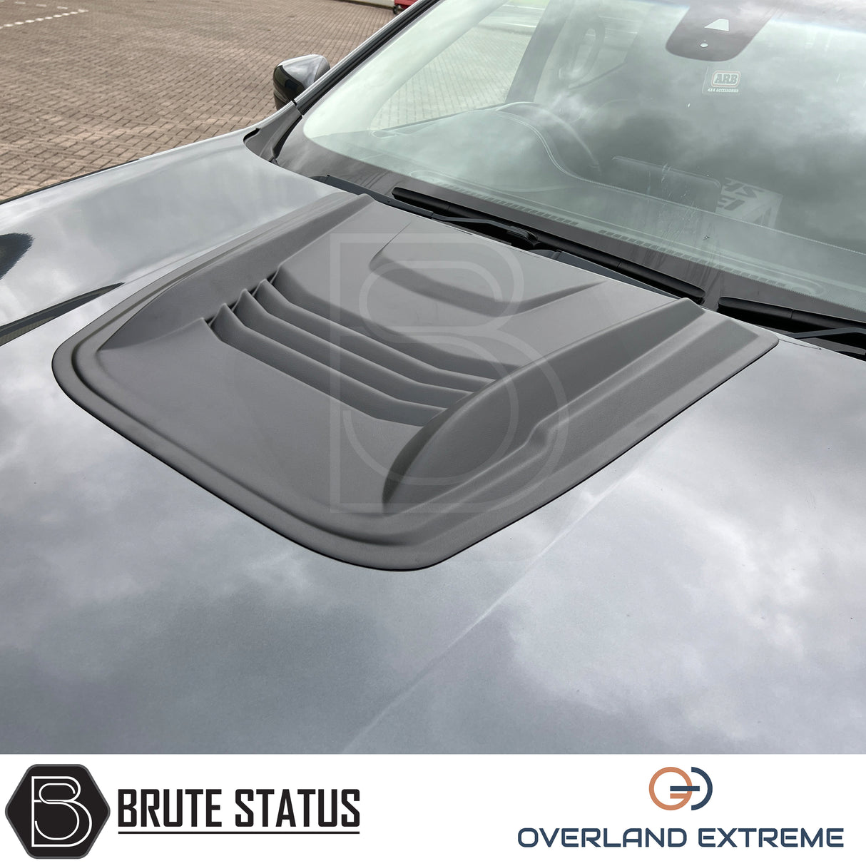 Universal pickup truck bonnet scoop with textured matte black finish, Overland Extreme hood scoop designed for rugged off-road styling.