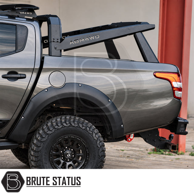 Universal S70 tent roll bar for pickup trucks with heavy duty carbon steel construction and matte black powder coated finish for roof tent mounting fitted onto L200. 
