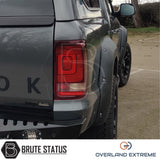 Matte black wide body arch kit for VW Amarok 2010-2017, enhancing pickup truck styling with premium wheel arch extensions.