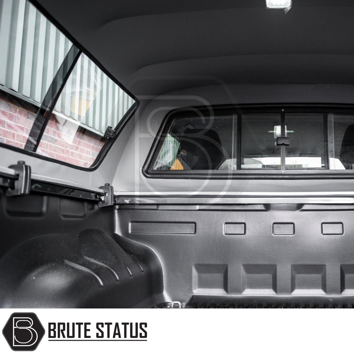Volkswagen Amarok 2010-2022 Truckman GLS Hardtop Canopy with lockable sliding windows, bed liner, and tonneau cover rails, enhancing security and functionality for truck enthusiasts.