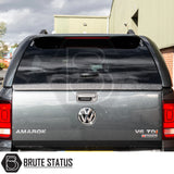 Volkswagen Amarok 2010-2022 Truckman GLS Hardtop Canopy with remote locking and sliding windows, enhancing load space and security. Tailgate features Amarok and V6 TDI 4MOTION badges.