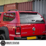 Volkswagen Amarok 2010-2022 Truckman GLS Hardtop Canopy with remote locking, featuring roof racks, smoked taillights, and chunky off-road tires, enhancing storage and style.
