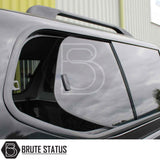 Volkswagen Amarok 2010-2022 Truckman GLS Hardtop Canopy with glossy black finish, tinted sliding window, and roof rack rails, showcasing secure, sporty design.