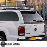 Volkswagen Amarok 2010-2022 Truckman Grand Hardtop Canopy with remote locking, featuring tinted windows, chrome bumper, and VW branding, emphasizing premium style and security.