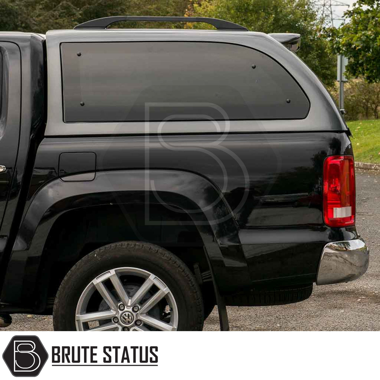 Volkswagen Amarok 2010-2022 Truckman Grand Hardtop Canopy features a cab-high design, tinted side windows, and roof rack rails, enhancing style and security.