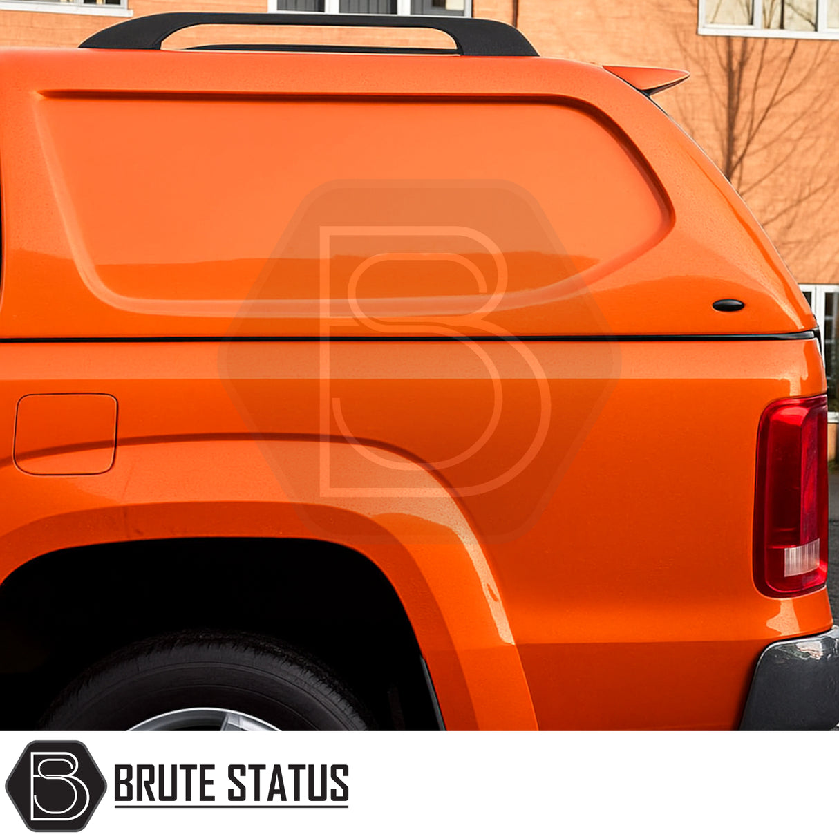 Volkswagen Amarok 2010-2022 Truckman L-Series Hardtop Canopy, rear view with black roof rack, wheel well, and taillight visible, enhancing security and storage.