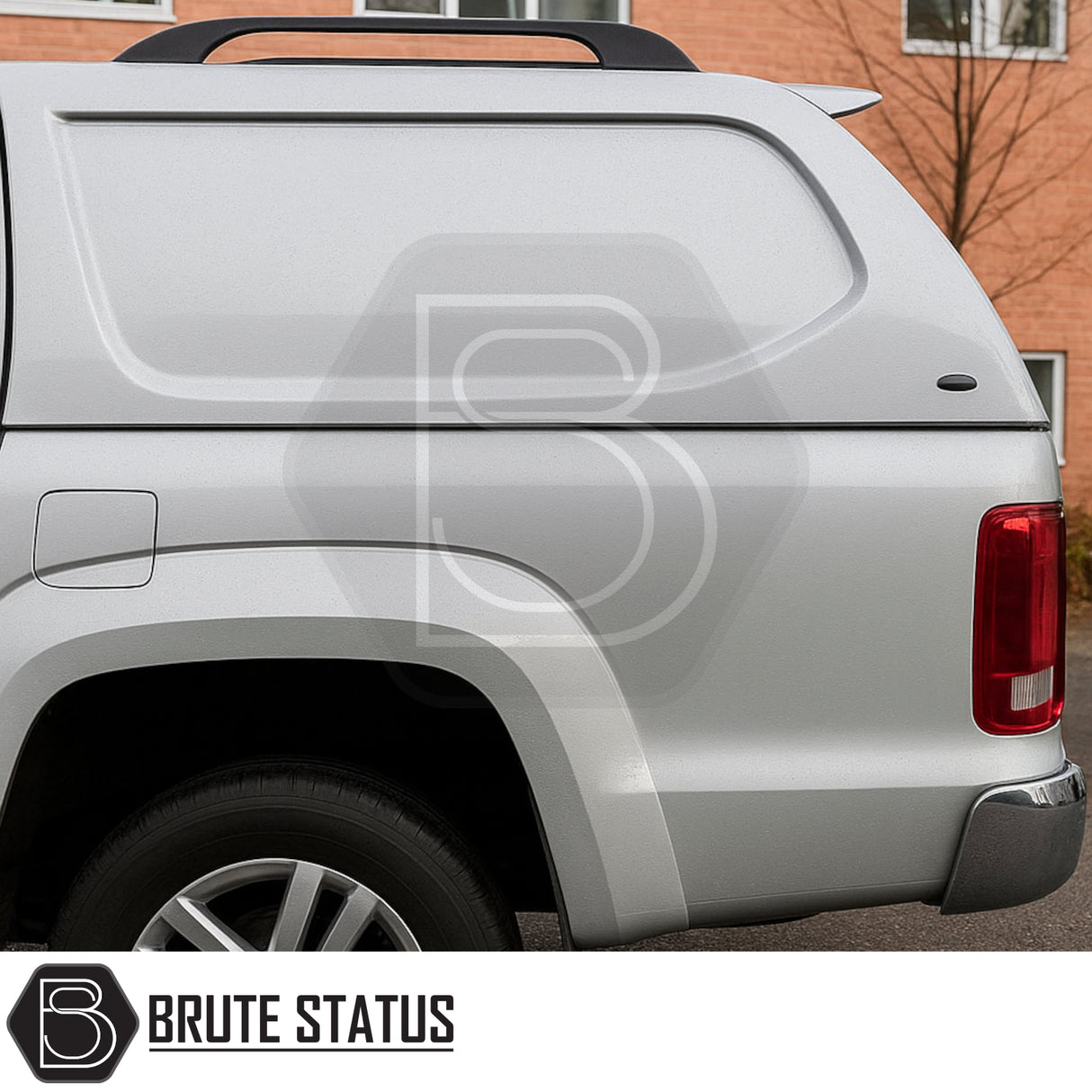 Volkswagen Amarok 2010-2022 Truckman L-Series Hardtop Canopy on a silver pickup, highlighting solid-sided design and rear tail light. Brute Status logo visible.