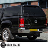 Volkswagen Amarok 2010-2022 Truckman RS Hardtop Canopy with solid rear window and remote locking, shown on a black pickup, enhancing security and utility.