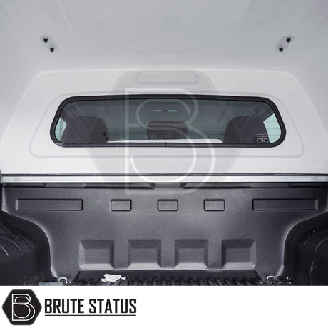 Volkswagen Amarok 2010-2022 Truckman RS Hardtop Canopy with solid rear window and remote locking, featuring a durable white fiberglass topper and secure black bed liner.