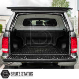 Volkswagen Amarok 2010-2022 Truckman RS Hardtop Canopy with solid rear window and remote locking, shown on a pickup truck with open tailgate and flipped-up cover.