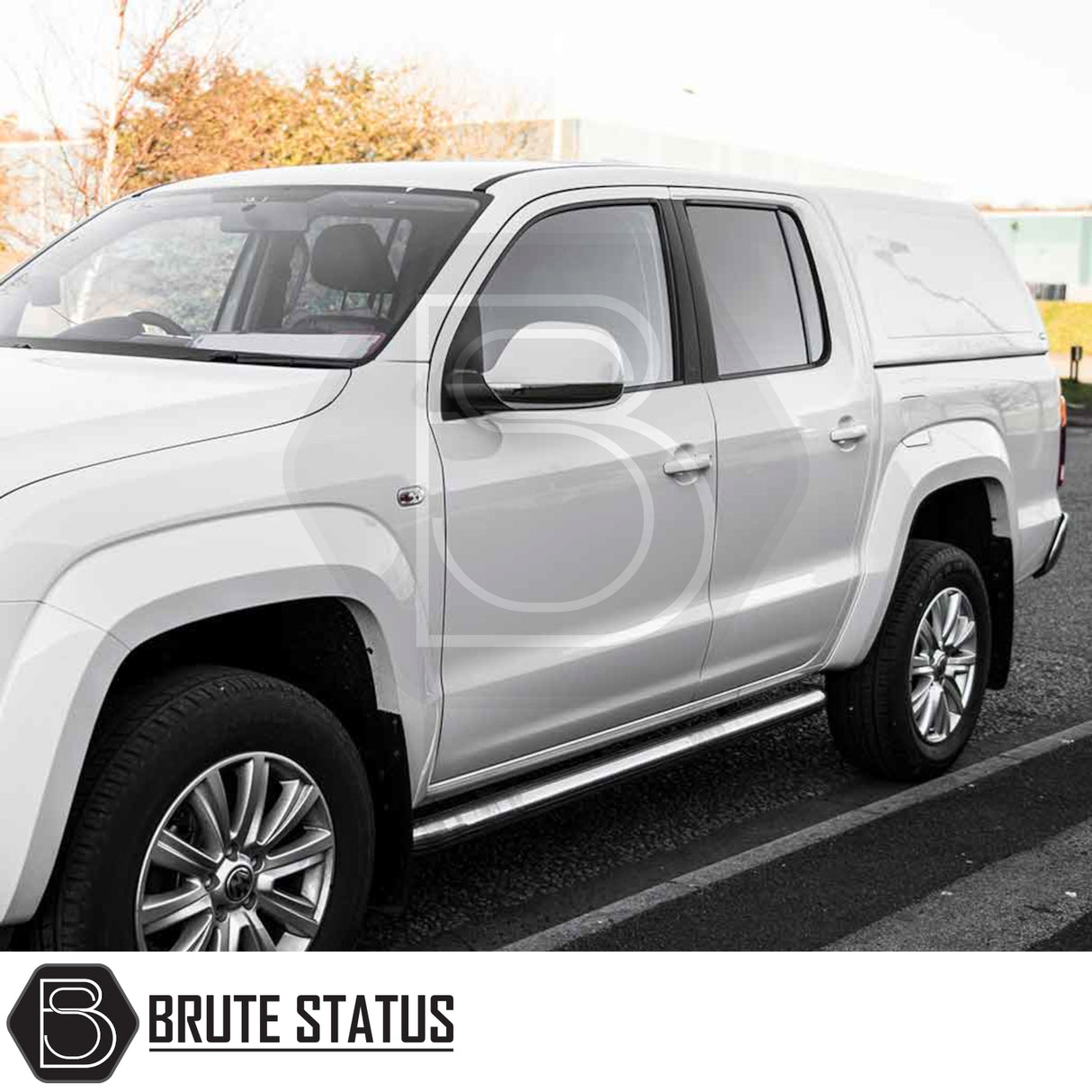 Volkswagen Amarok 2010-2022 with Truckman RS Hardtop Canopy featuring solid sides, chrome side steps, and alloy wheels, ideal for secure and stylish aftermarket customization.