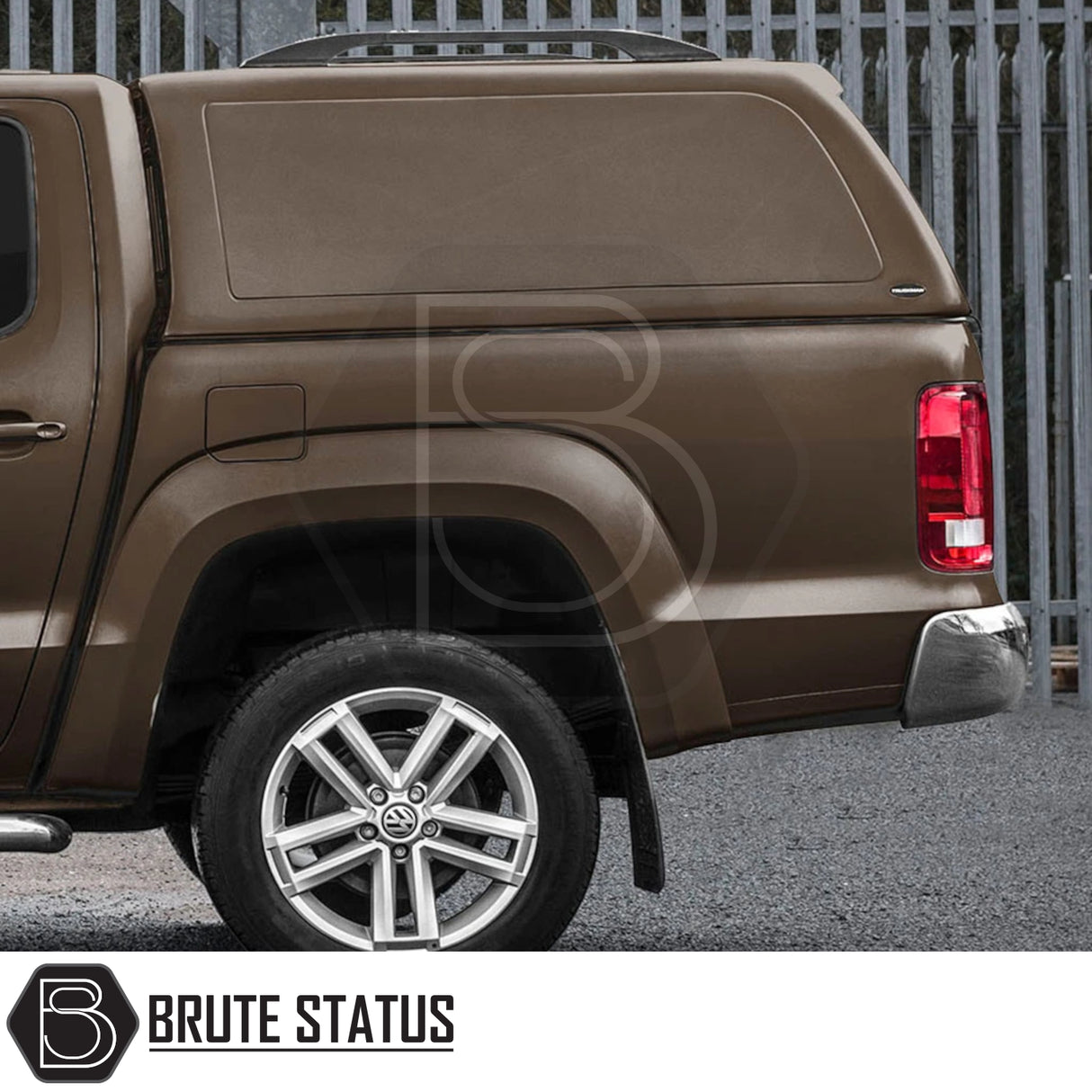 Volkswagen Amarok 2010-2022 Truckman RS Hardtop Canopy with solid rear window and remote locking, showcasing the rear view and alloy rim with VW logo.