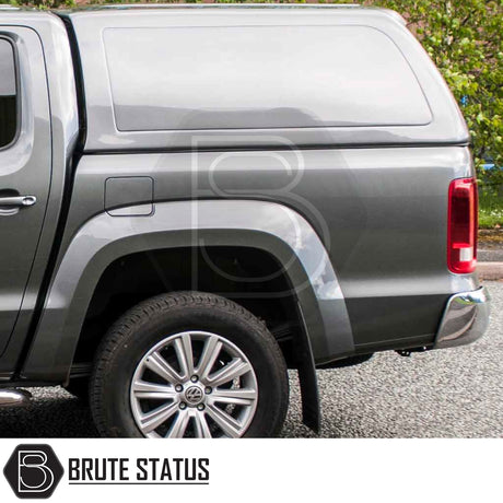 Rear view of Volkswagen Amarok with Truckman RS Hardtop Canopy, showcasing solid-sided design and alloy wheel, ideal for enhanced security and commercial utility.