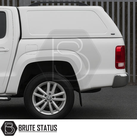Rear-side view of Volkswagen Amarok 2010-2022 Truckman RS Hardtop Canopy, featuring solid sides and a glazed rear window with Brute Status branding.