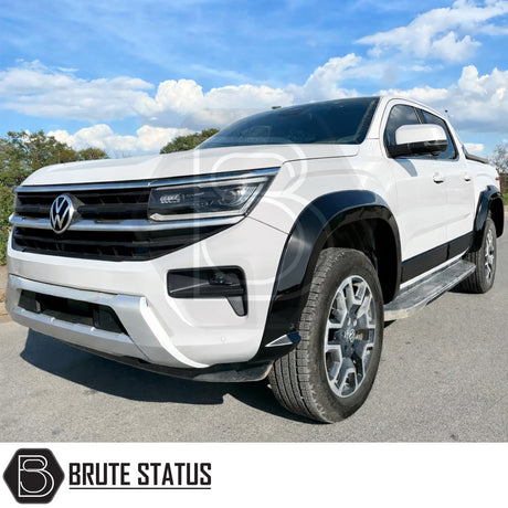 Volkswagen Amarok 2023+ Gloss Black Wide Arch Kit (Overland Extreme) fitted to double cab model, premium ABS wheel arch extensions with UV-resistant finish and precision CAD-designed fitment.