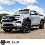 Modified Volkswagen Amarok 2023 fitted with gloss black wheel arch extensions for aggressive off-road styling and wider body appearance
