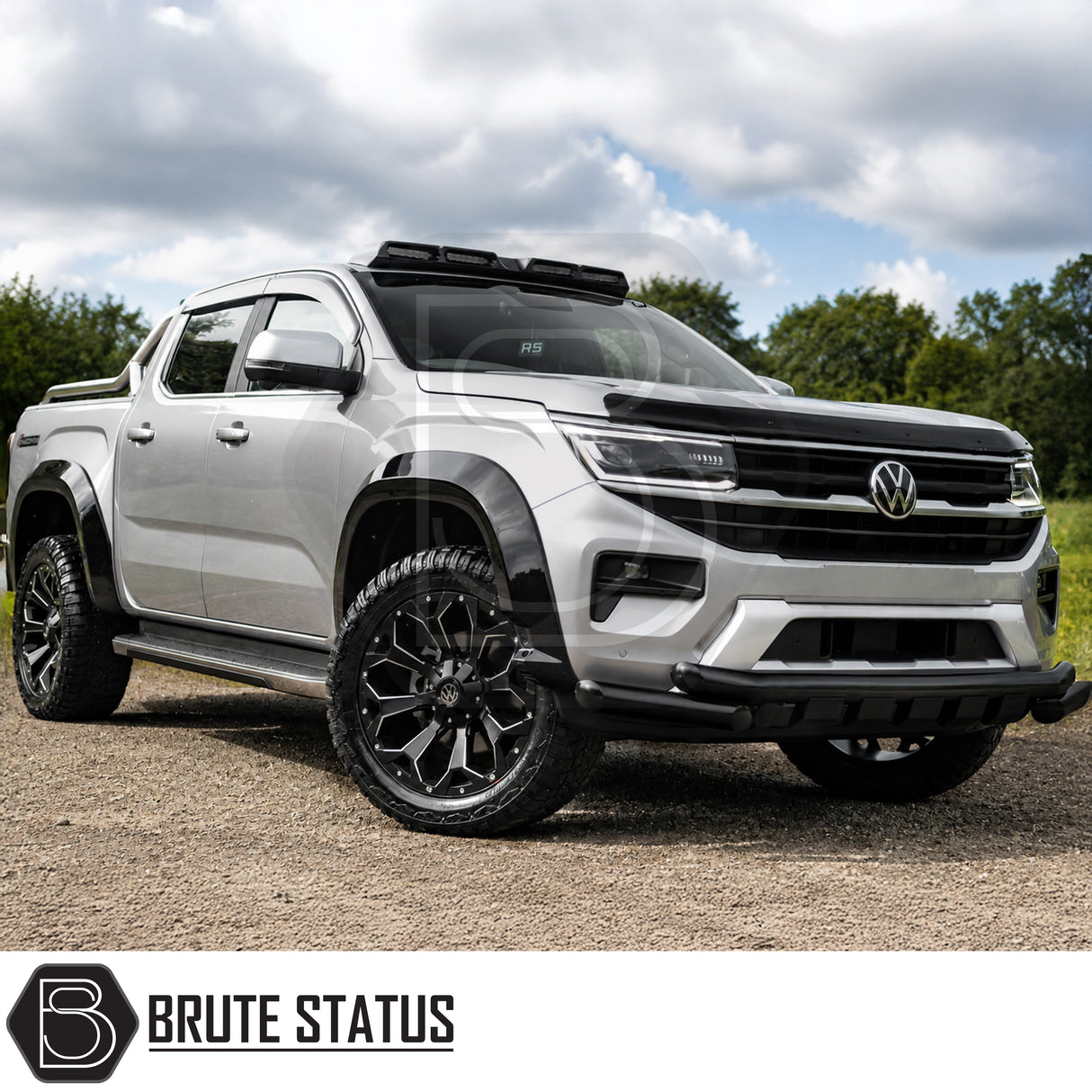 Volkswagen Amarok 2023+ wide arch kit installed on pickup truck featuring UV-resistant gloss black finish and premium Overland Extreme design