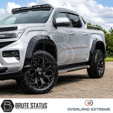 Overland Extreme Volkswagen Amarok wide arch kit with gloss black finish and professional rubber seal fitment.