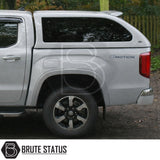 Volkswagen Amarok 2023+ Truckman Grand Hardtop Canopy with remote locking, shown in rear three-quarter view with tinted canopy window and 4MOTION badging.