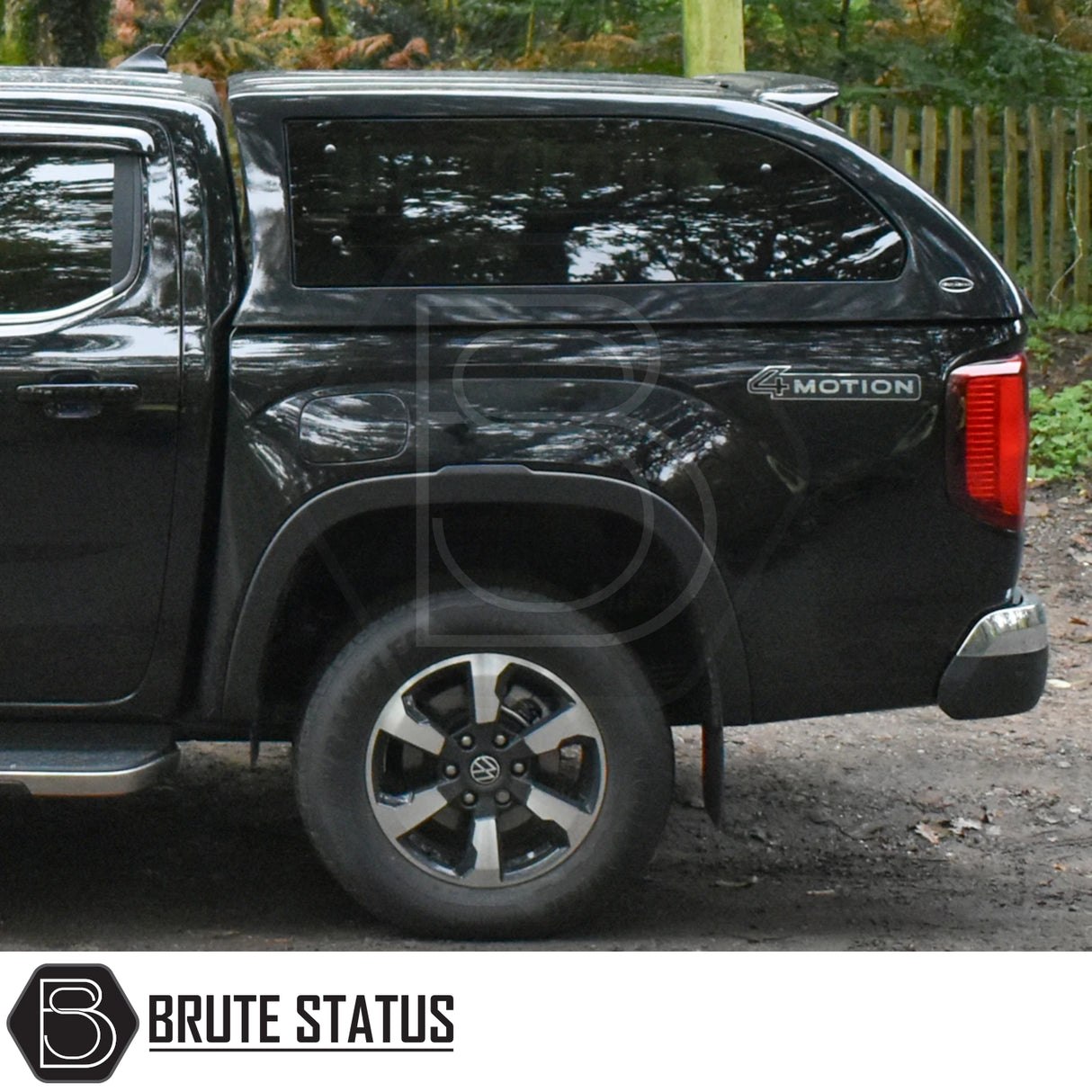 Volkswagen Amarok 2023+ Truckman Grand Hardtop Canopy with remote locking, featuring tinted pop-out side windows and alloy rear wheel, enhancing storage space and security.