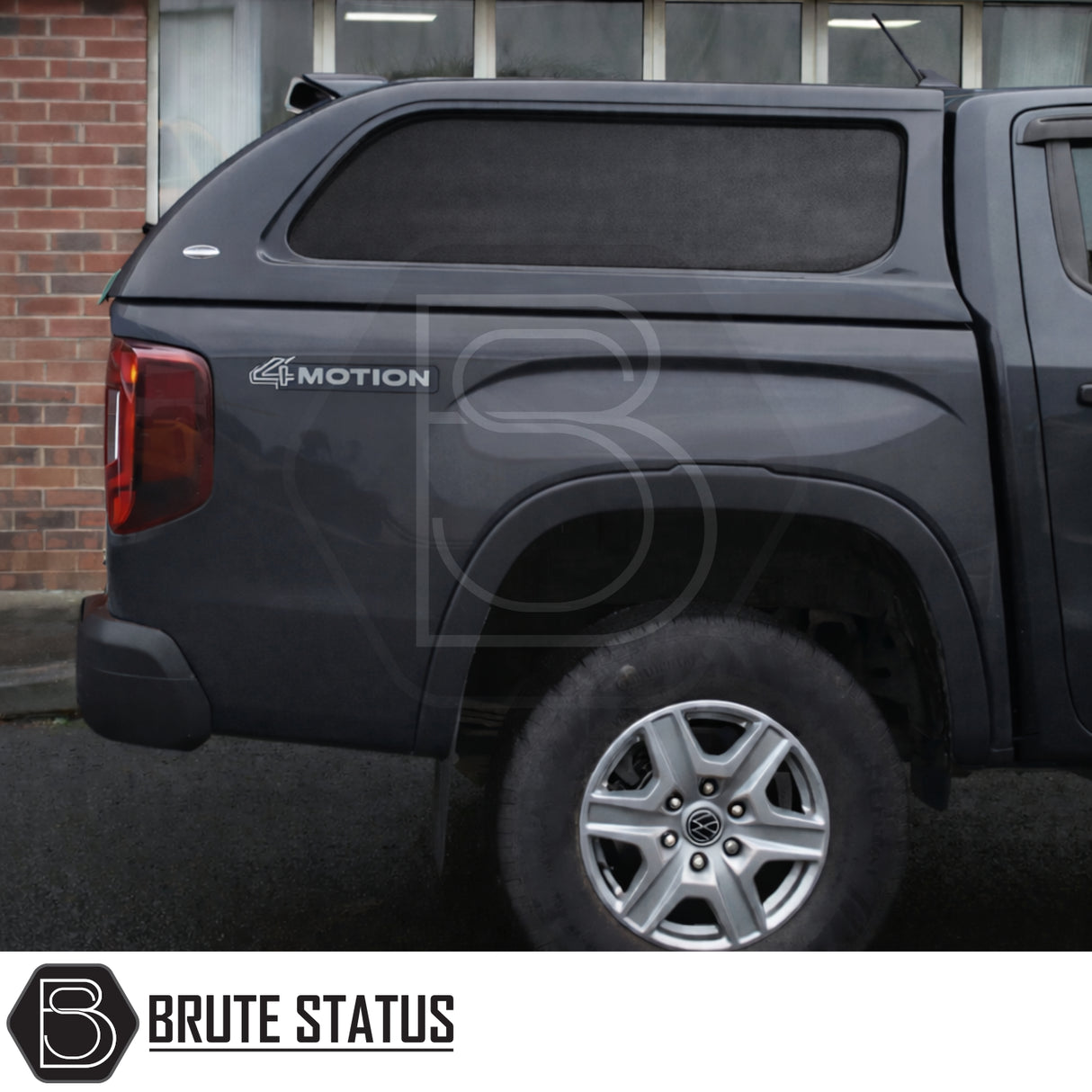 Volkswagen Amarok 2023+ Truckman L-Series Hardtop Canopy with remote locking, visible 4MOTION badge, alloy wheel, canopy side window, and Brute Status logo watermark.