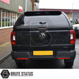 Rear view of a black Volkswagen Amarok with a Truckman L-Series Hardtop Canopy, showcasing its solid-sided design and remote locking feature.